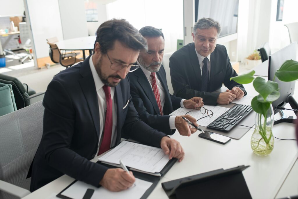 Eye On Bits team reviewing a client's security programme